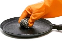 Recipes and methods on how to clean a cast-iron pan from black carbon deposits at home