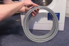 In welke gevallen en hoe wordt de zonnedakmanchet van de Samsung-wasmachine correct vervangen?